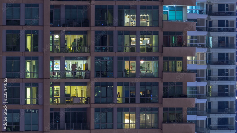 Glowing windows of skyscrapers at evening timelapse Glowing windows of skyscrapers at evening timelapse