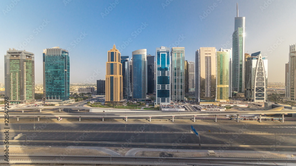 Aerial view of Jumeirah lakes towers skyscrapers timelapse with traffic on sheikh zayed road. Aerial view of Jumeirah lakes towers skyscrapers timelapse with traffic on sheikh zayed road.