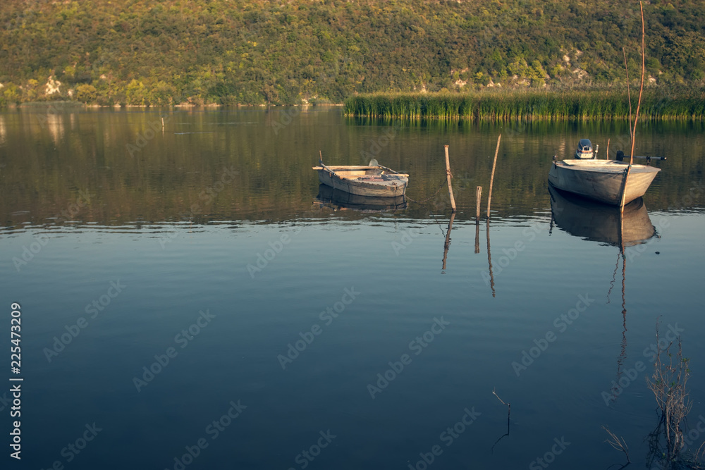 Fishing boat anchored near to the banks of the river. Fishing boat anchored near to the banks of the river.