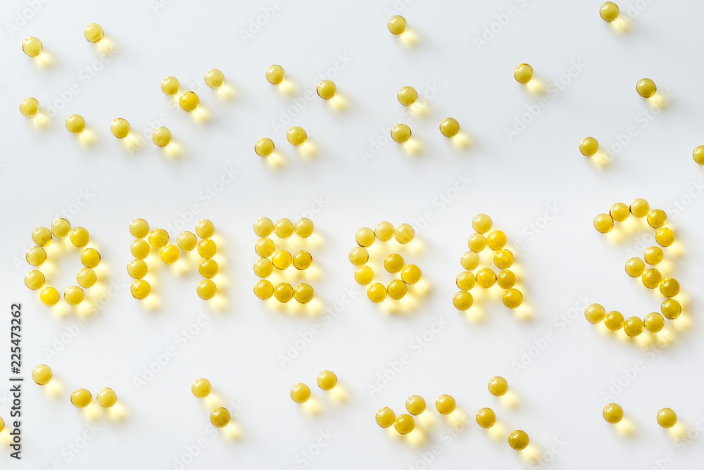 Omega-3 fish oil capsules on the white background