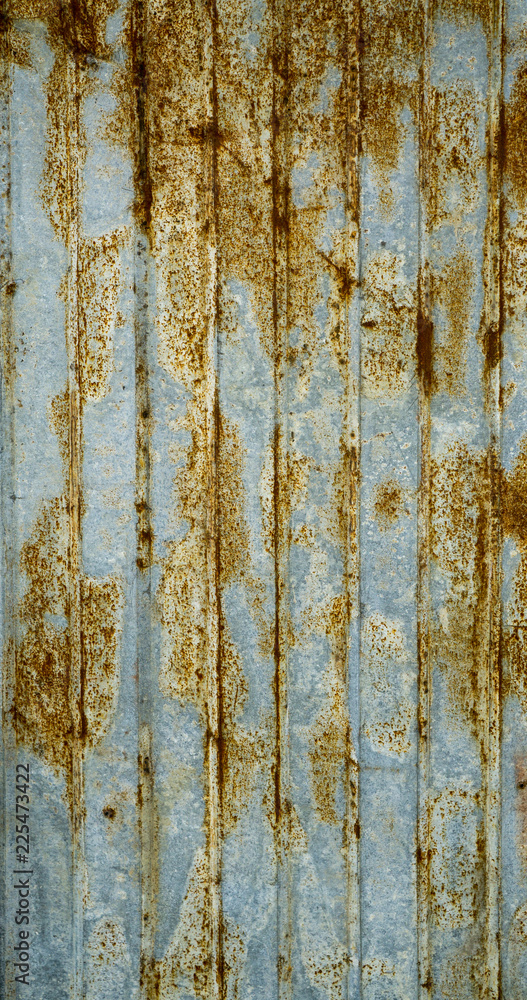 Fototapeta premium Abstract corroded colorful rusty metal background.