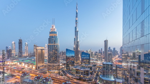 Print op canvas Dubai downtown skyline day to night timelapse with tallest building and Sheikh Z