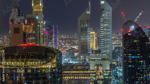 Skyline view of the buildings of Sheikh Zayed Road and DIFC night timelapse in Dubai  UAE.