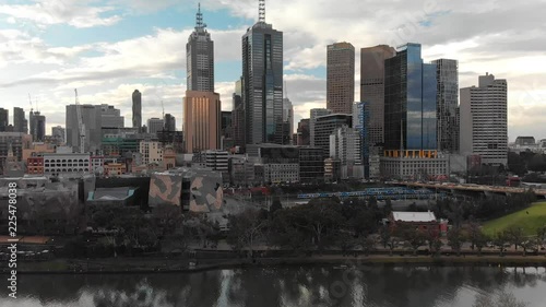 MELBOURNE, AUSTRALIA - SEPTEMBER 6, 2018: Aerial view of city skyline at dusk. Melbourne attracts 15 million tourists annually photo