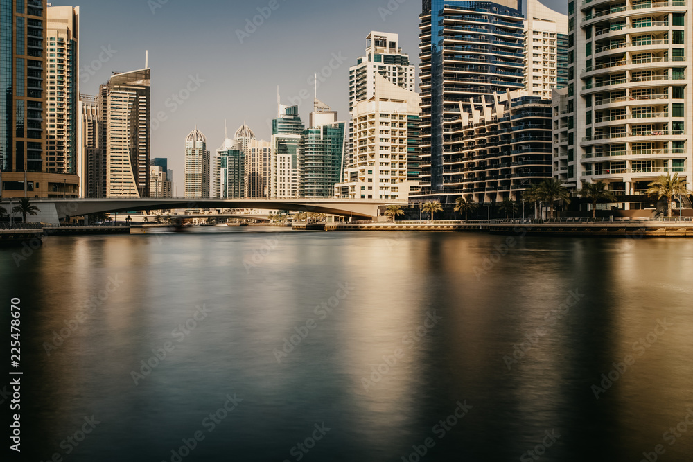 Beautiful view to Dubai Marina Promenade, UAE. Long exposure time lapse effect Beautiful view to Dubai Marina Promenade, UAE. Long exposure time lapse effect