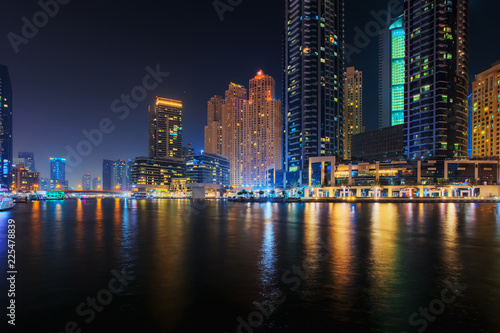 Beautiful view to Dubai Marina Promenade  UAE. Long exposure effect at night