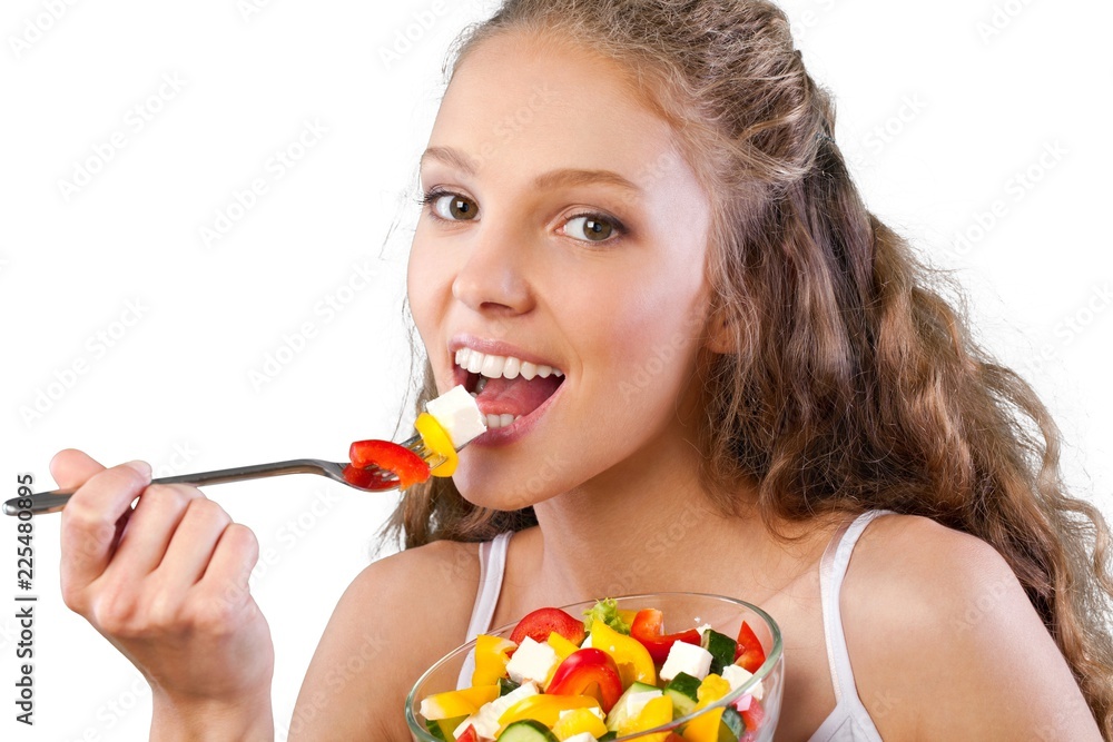 Portrait of a Young Woman Eating Salad Portrait of a Young Woman Eating Salad