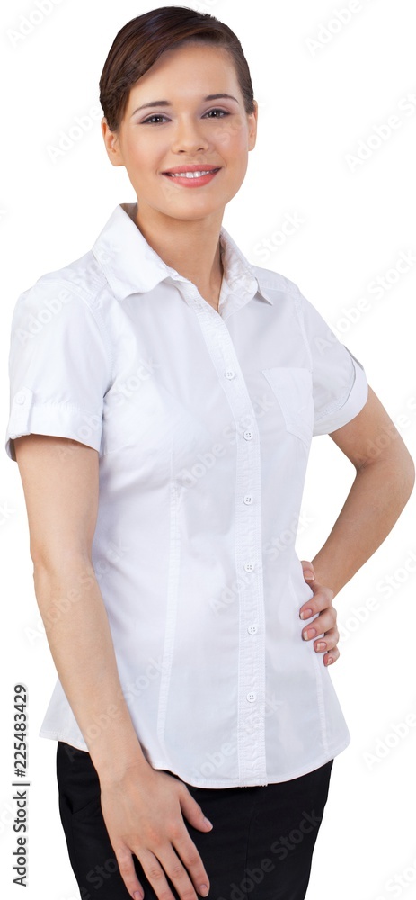 Smiling Young Businesswoman with Hand on Hip - Isolated Smiling Young Businesswoman with Hand on Hip - Isolated