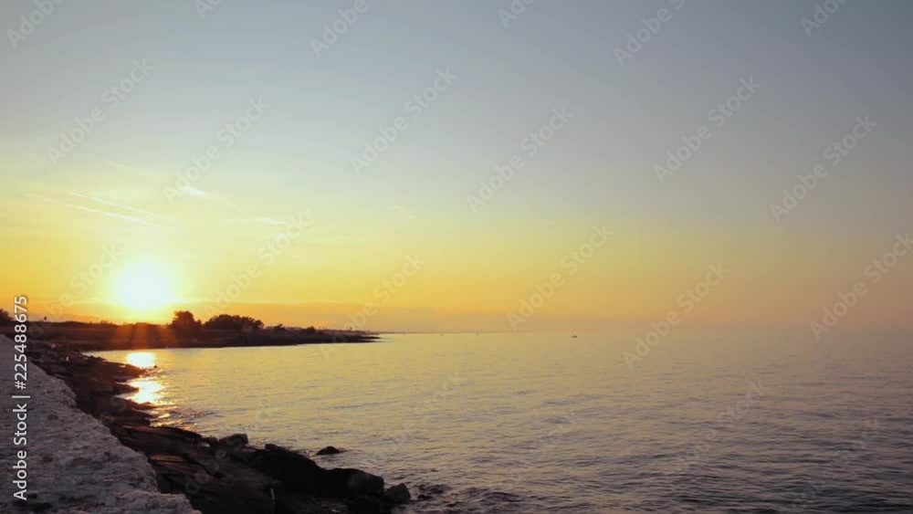 Seacoast in front of Villanova Marina Ostuni at sunset in a windy day of summer Seacoast in front of Villanova Marina Ostuni at sunset in a windy day of summer
