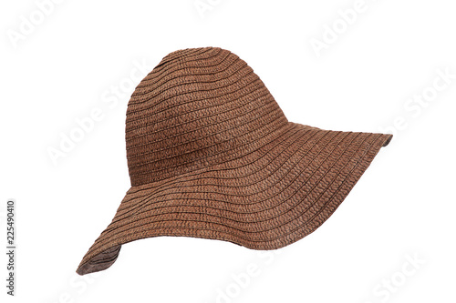 Summer beige straw hat isolated on white background.Close up of handcraft weave wide brim hat made from reed,bamboo,rattan.Decoration on plain design.Fashion,Holiday,Decor Concept. 