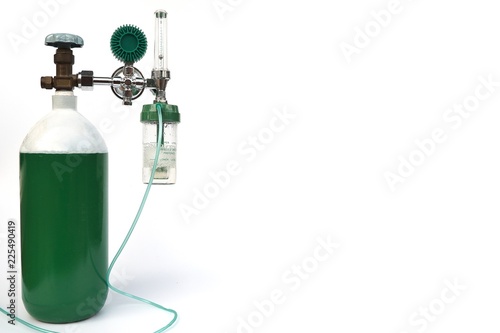 Equipment medical Oxygen tank and Cylinder Regulator gauge.Control pressure oxygen gas for care a patient respiratory disease and emergency CPR at Hospital, Close up focus on white background. photo