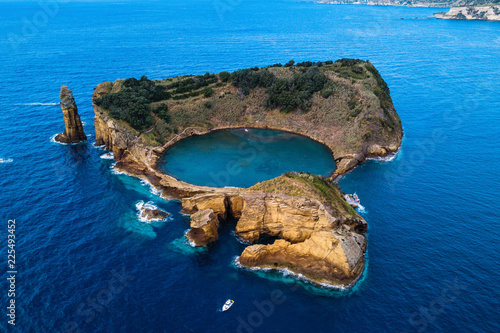 Top view of Islet of Vila Franca do Campo is formed by the crater of an old underwater volcano near San Miguel island, Azores, Portugal.