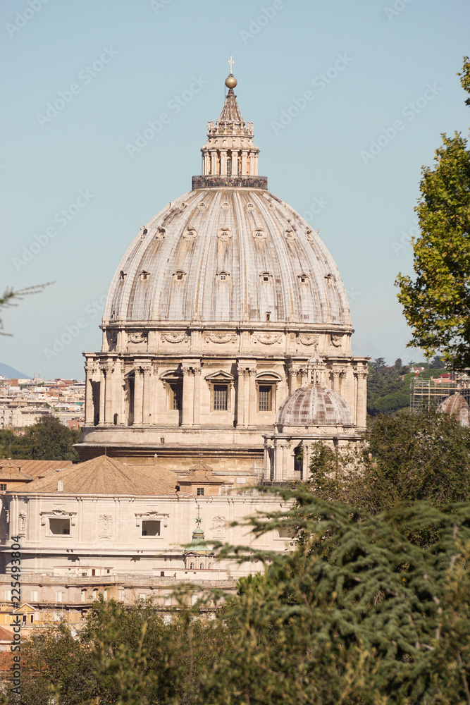 view of the Vatican dome of Saint Peter Basilica (San Pietro) in Rome, Italy