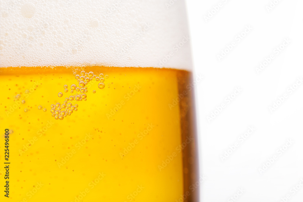 Pouring beer with bubble froth in glass for background. Summer drink, October fest texture Pouring beer with bubble froth in glass for background. Summer drink, October fest texture