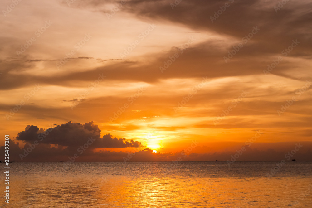 Beautiful tropical sunset on the beach and sea Beautiful tropical sunset on the beach and sea