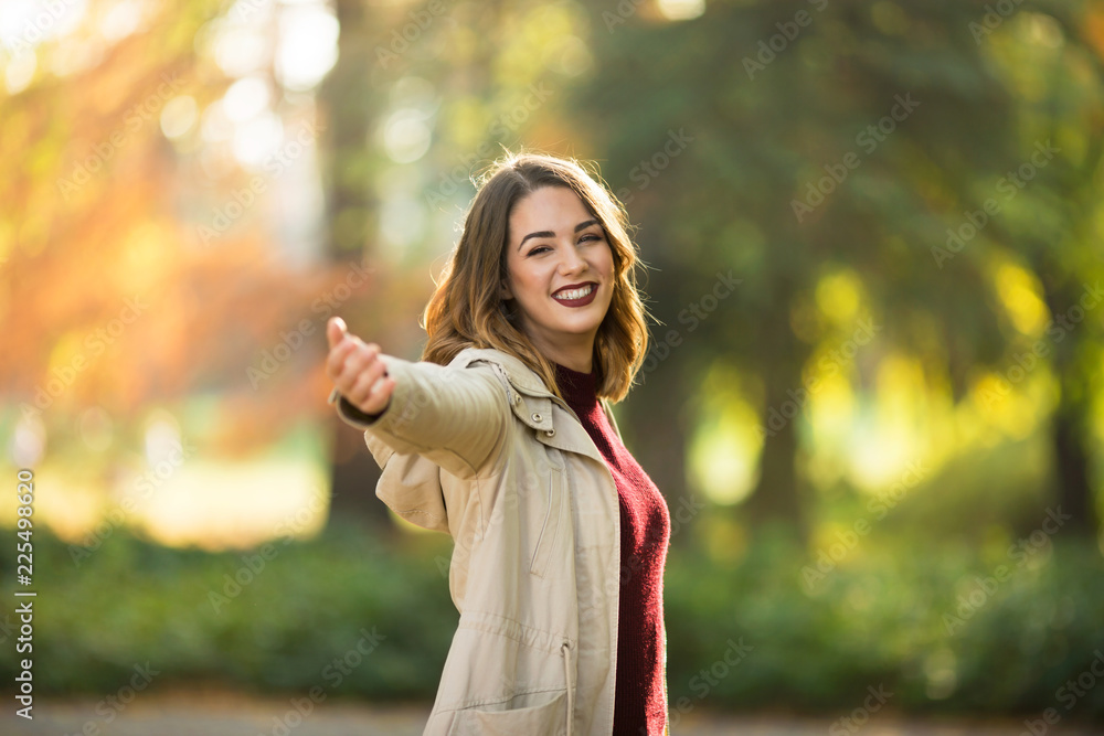 Happy and carefree young woman laughing Happy and carefree young woman laughing