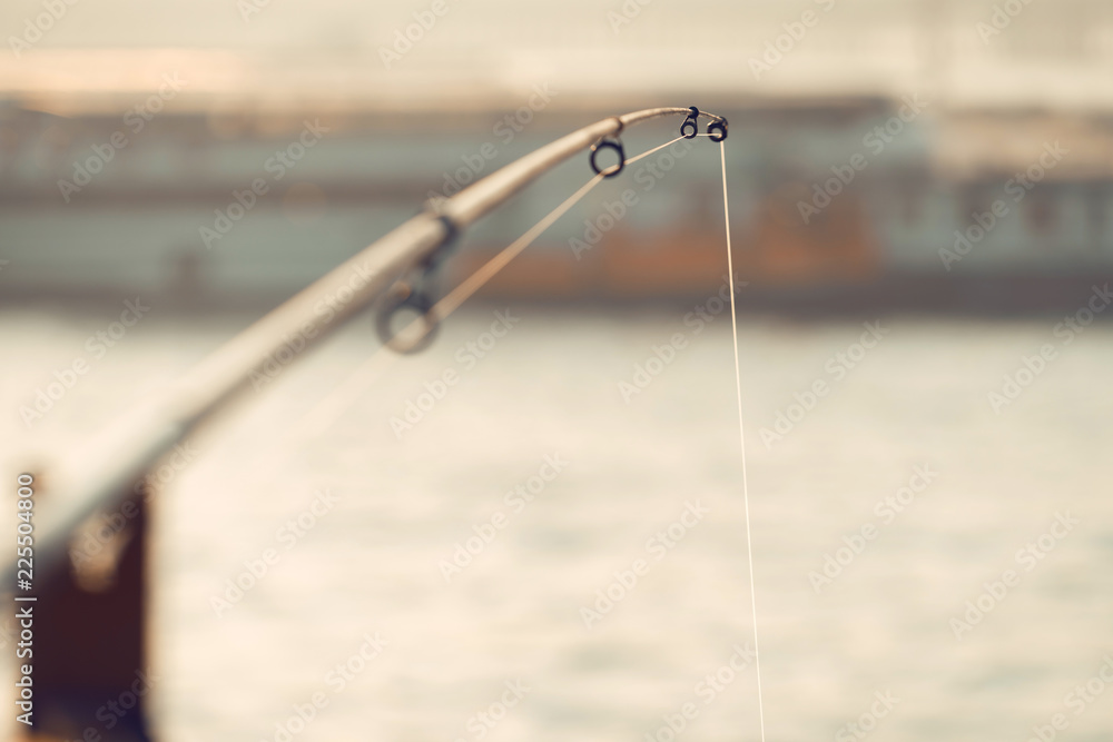 fishing pole with fishing line, fishing on the bridge fishing pole with fishing line, fishing on the bridge