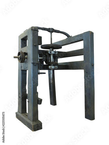 Vintage old wooden drilling machine isolated over white