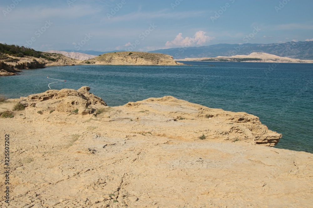 Sea and rocks on Rab island, Croatia. Near the town Lopar and Livacina beach. South-east Europe.
