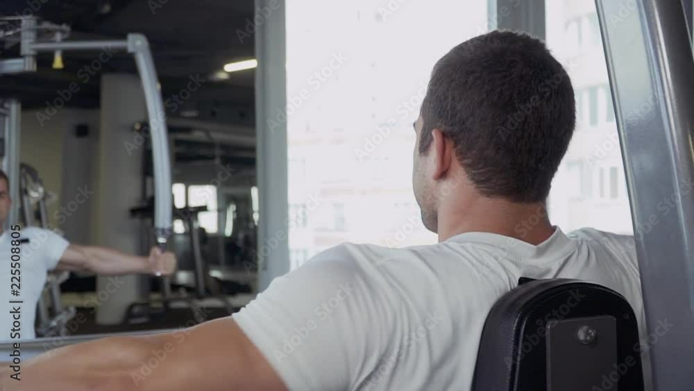 Handsome guy is engaged in the gym Handsome guy is engaged in the gym