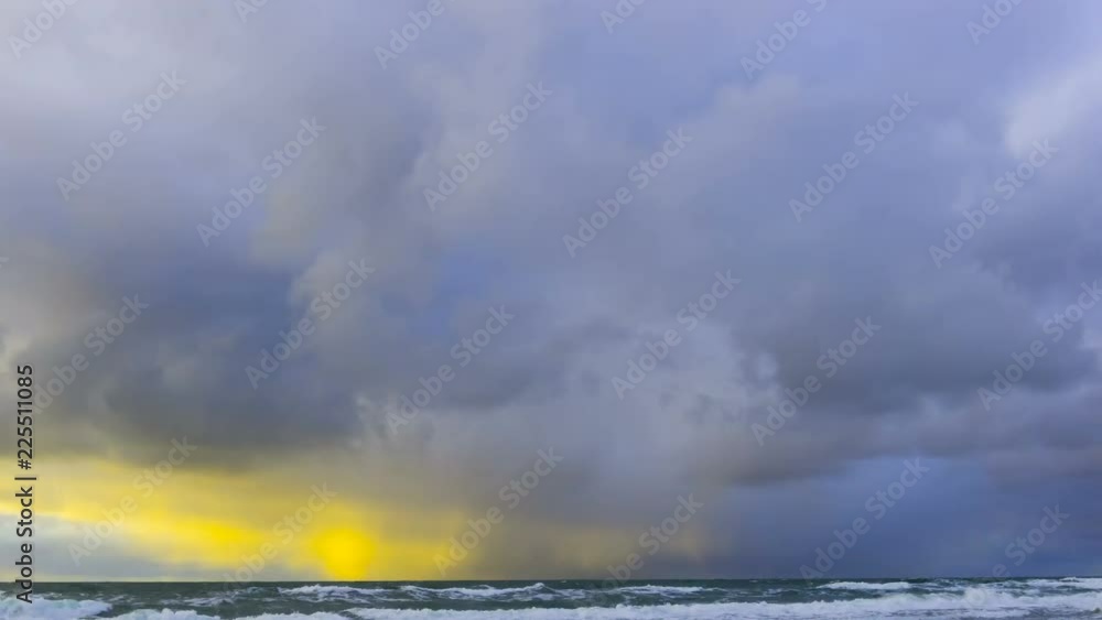 Dark and dramatic storm cloud area background. Time Lapse. Epic storm tropical clouds at sunset. Coast of the Pacific Ocean. Palm beach. Timelapse 4K UHD. Dark and dramatic storm cloud area background. Time Lapse. Epic storm tropical clouds at sunset. Coast of the Pacific Ocean. Palm beach. Timelapse 4K UHD.