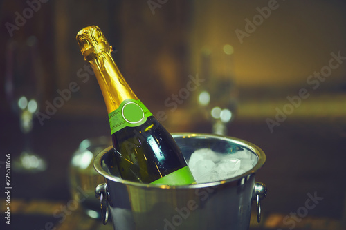 Emotional bartender spills champagne behind the bar