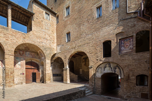 San Gimignano Italy July 2nd 2015 : Entrance and courtyard to the Musei Civici in San Gimignano, Tuscany, Italy