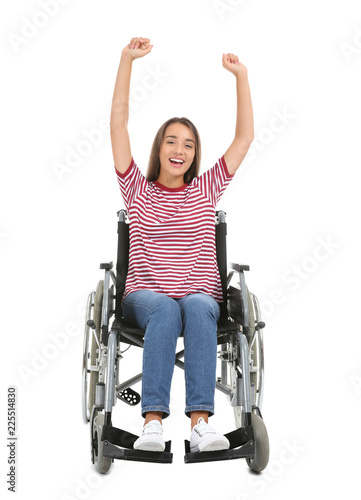 Happy young woman sitting i...