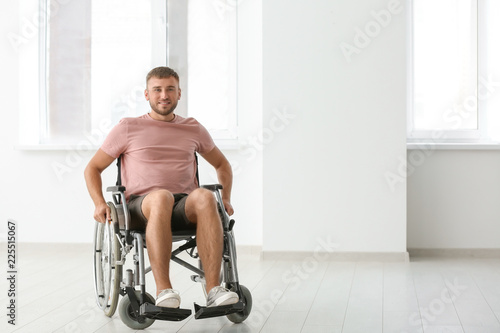 Young invalid man in empty ...