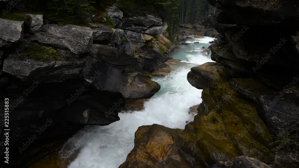 Raging rive running through rocks in Yoho Valley, BC, Canada Raging rive running through rocks in Yoho Valley, BC, Canada