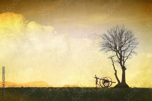 Slika na platnu Vintage landscape with mountains,  single tree and carter