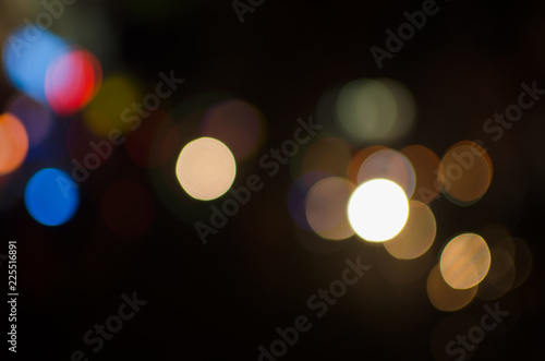 Abstract city night defocused light, blur bokeh, colorful & dark background. Street, dreamy, shiny & urban. © BentChang