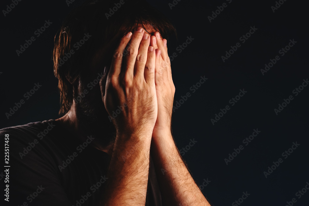 Man is crying in despair Man is crying in despair