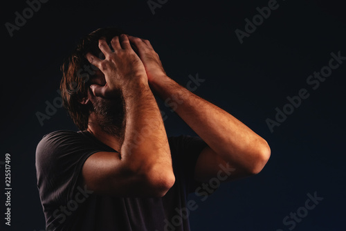 Obraz na plátně Man is crying in despair