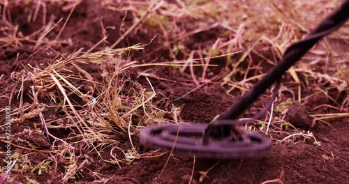 Metal detector search for non-ferrous metal jewelry in the territory of the former Soviet Union.