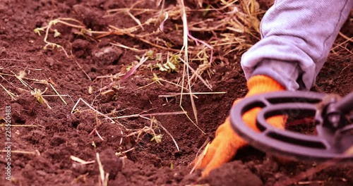 Metal detector search for non-ferrous metal jewelry in the territory of the former Soviet Union.