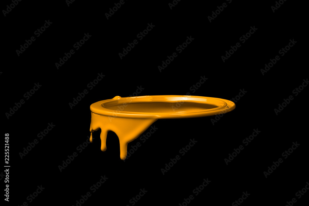 Orange paint flowing down on wall of metal bucket. Isolated over black background Orange paint flowing down on wall of metal bucket. Isolated over black background