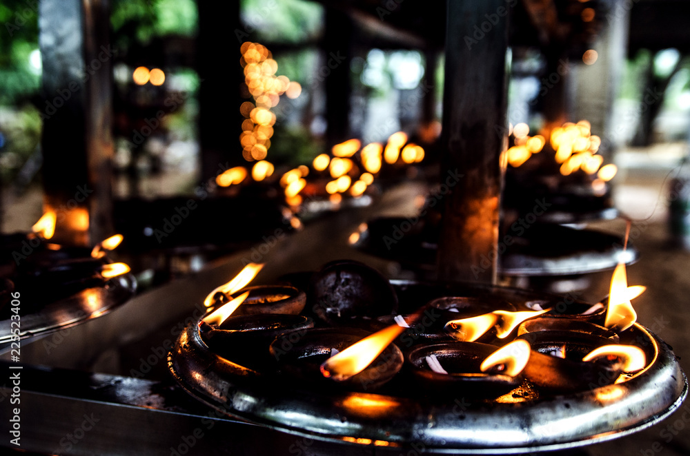 Burning candles in a Buddhist temple. Kalutara. Sri Lanka.
Burning candles in a Buddhist temple. Kalutara. Sri Lanka.