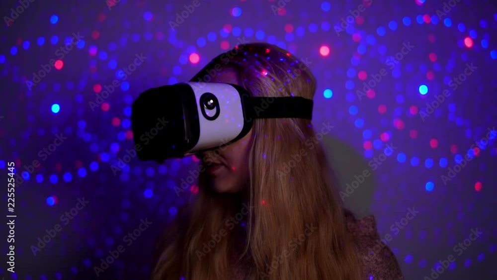 Young woman wearing VR headset Young woman wearing VR headset