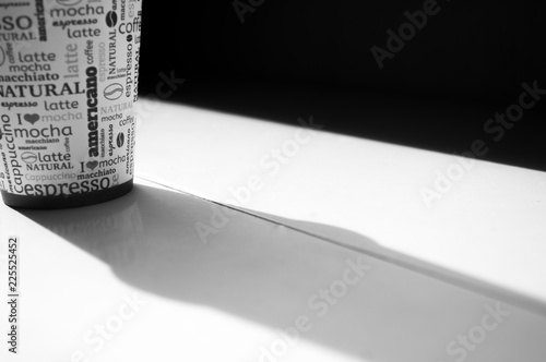 Cup on table ,abstract background