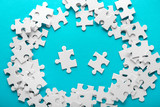 Composition with pieces of jigsaw puzzle on color background