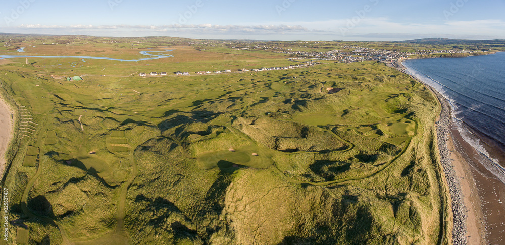 scenic aerial birds eye panoramic irish landscape from lahinch in county clare, ireland. beautiful lahinch beach and golf course along the wild atlantic way