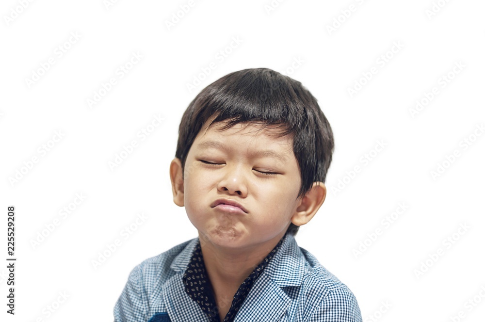 Asian boy is making expression isolated over white Asian boy is making expression isolated over white