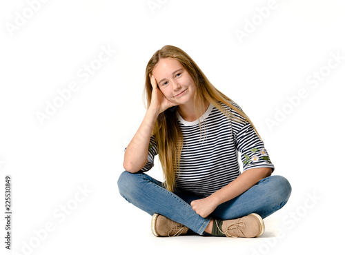 Young teen girl on white background