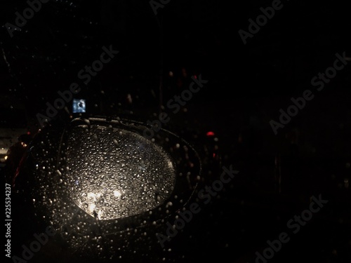 Rain spray on the wing mirror 