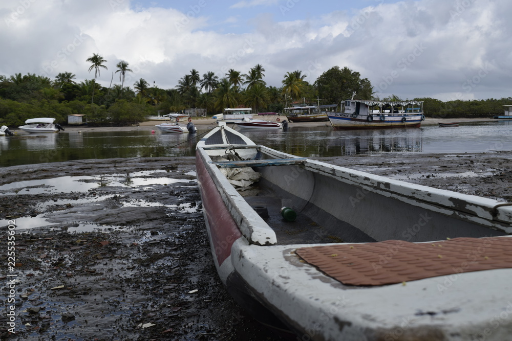 canoe and fishing boat, island of Boipeba, Cairu, Bahia, Brazil