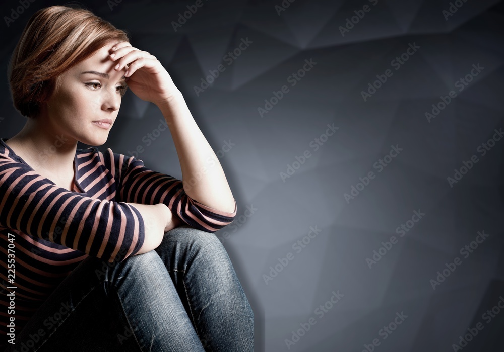 Young woman crying on background Young woman crying on background