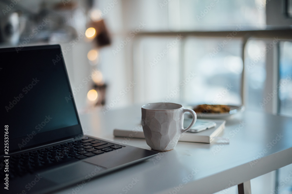 Modern white office, designer handmade cup with coffee, smartpho Modern white office, designer handmade cup with coffee, smartpho