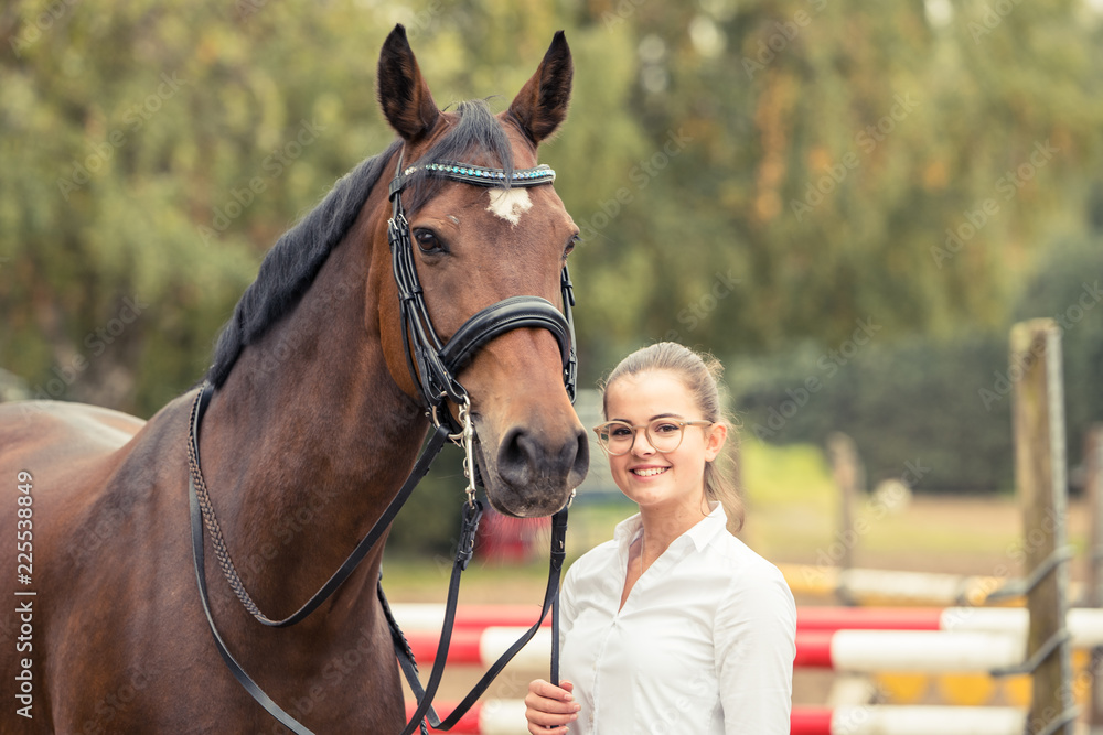 Obraz premium Girl and horse