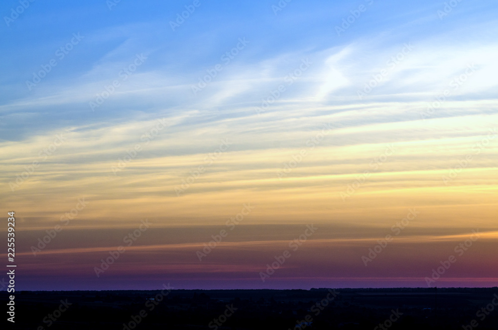 gradient sky with light clouds